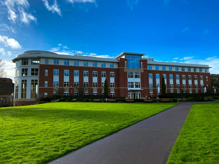 University campus with green lawn